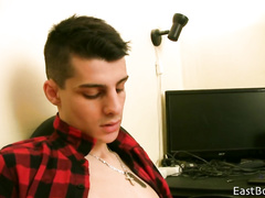 Hungry teen twink watches hot gay porn video and wanks off